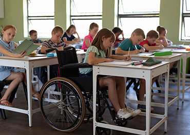 Handicapper students are learning in a classroom