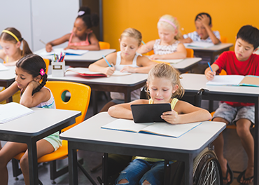 Young kids are learning in a classroom School kids are learning in a classroom