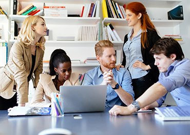 Educator offer coaching in a school library