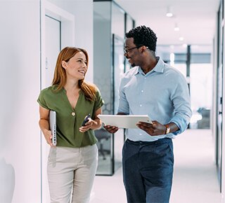 Group of business professionals working together in an office